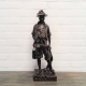 Bronzen sculpture van jonge jager met geschoten wild. Hoogte 50 cm